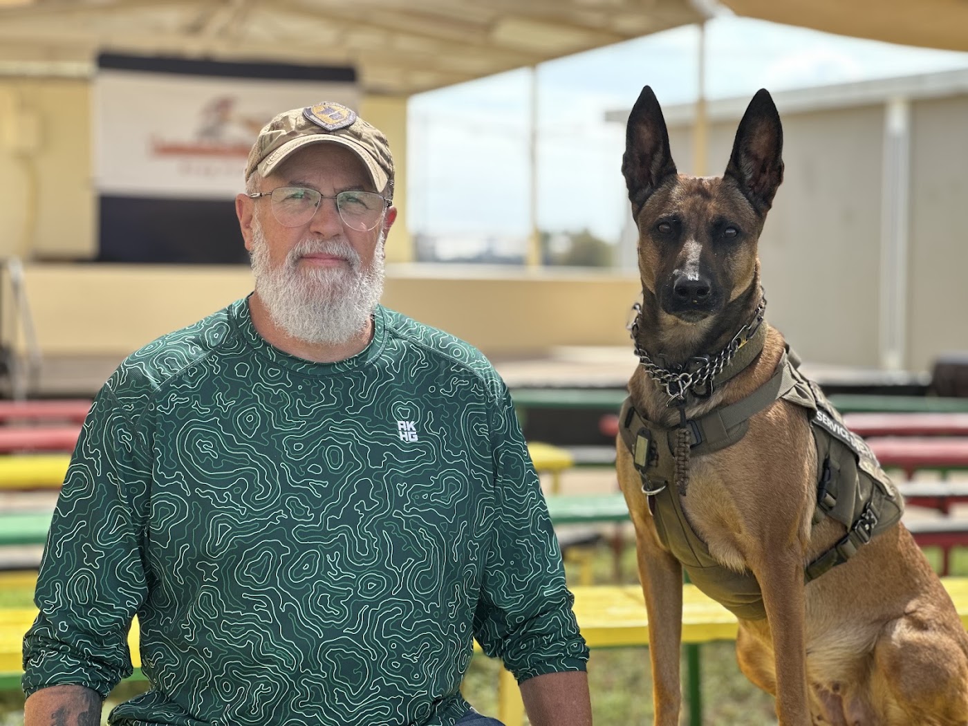 Photo attached to GBW175's Google review of 00K9 GSD Twins Dog Training — handler with his working service dog